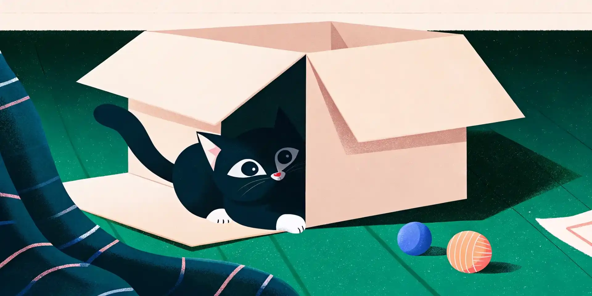 A kitten exploring a cardboard box