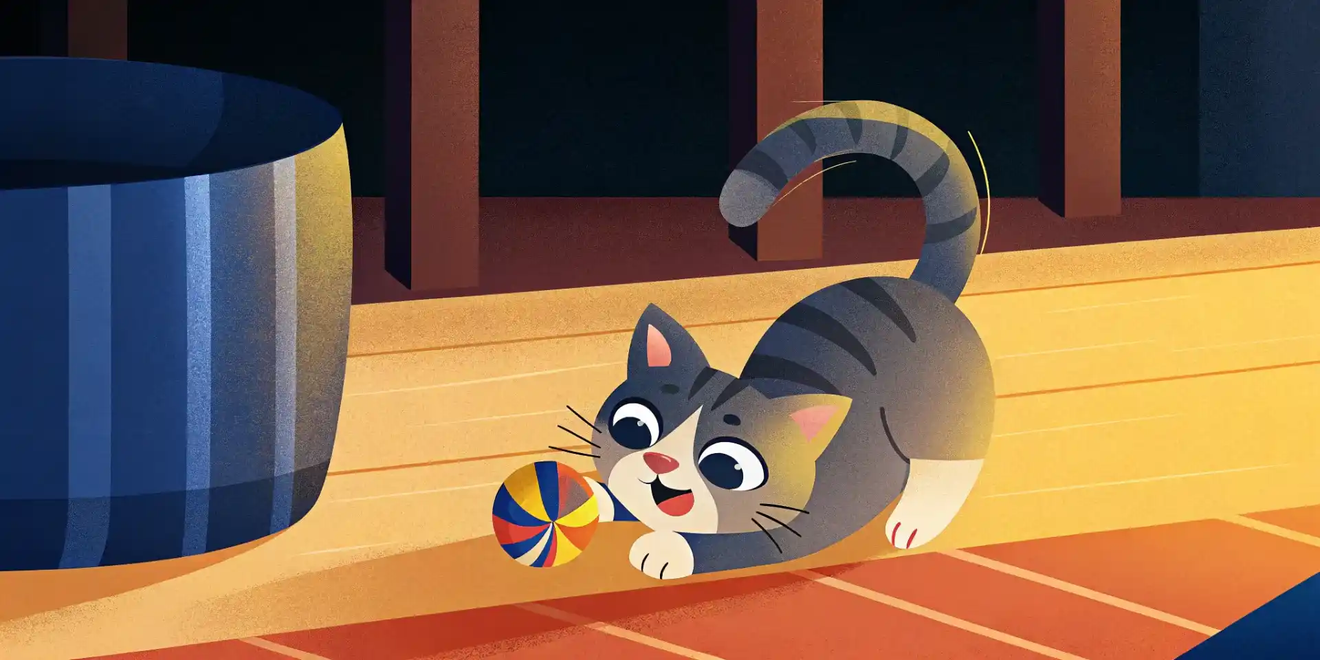 A happy, healthy kitten playing with a toy